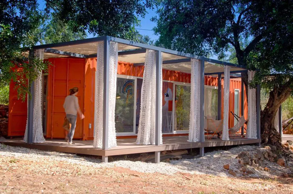 Container conversion guest cabin with finished interior