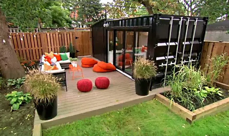 Container man-cave conversion with finished entertainment interior