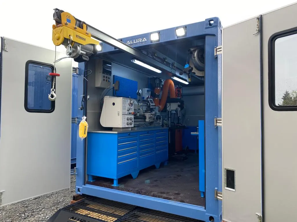 Custom mobile shop container with workstation outfit